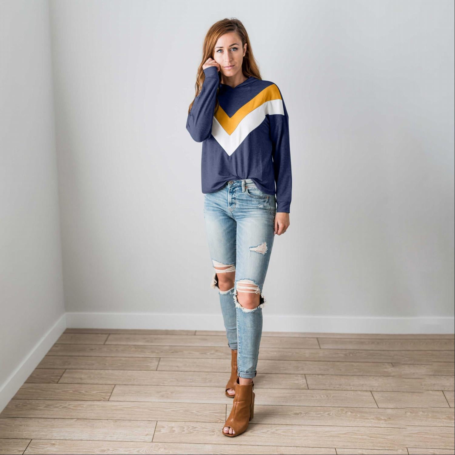 A vibrant Chevron Long Sleeve Top featuring a color blocked, chunky chevron design, perfect for casual wear.