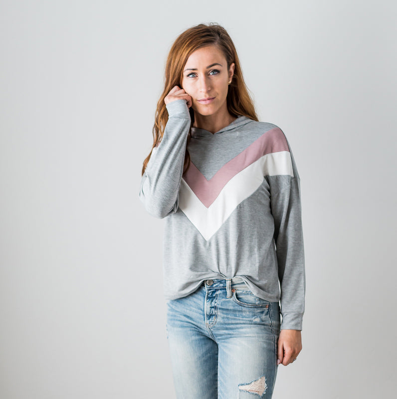 A vibrant Chevron Long Sleeve Top featuring a color blocked, chunky chevron design, perfect for casual wear.