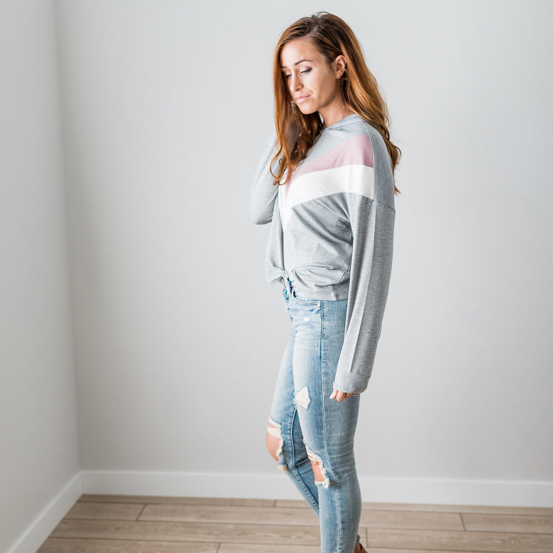 A vibrant Chevron Long Sleeve Top featuring a color blocked, chunky chevron design, perfect for casual wear.