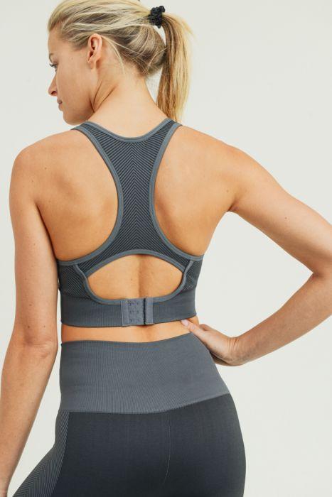 Chevron Track Seamless Hybrid Racerback Sports Bra featuring chevron lines and adjustable straps, designed for comfort and style.