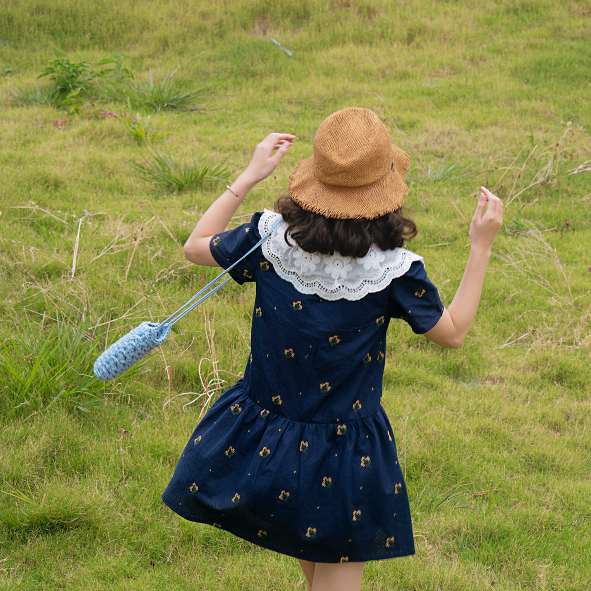 Cheezy Jumpsuit featuring floral embroidery and a lace neck design, showcasing a stylish skirt-pants silhouette.