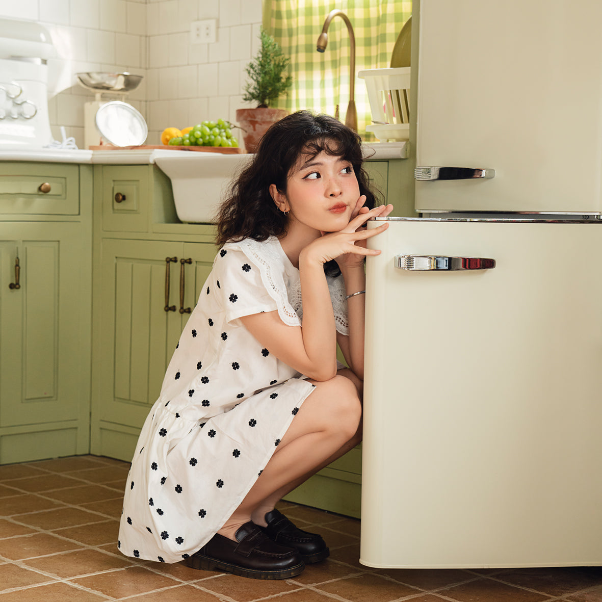 Cheezy Jumpsuit featuring floral embroidery and a lace neck design, showcasing a stylish skirt-pants silhouette.