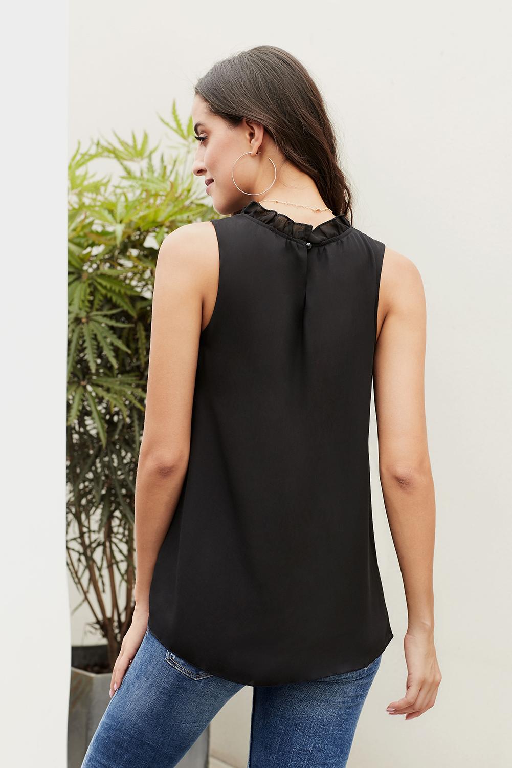 Chic black tank top featuring ruffle trim neckline and pleated detailing, perfect for summer wear.