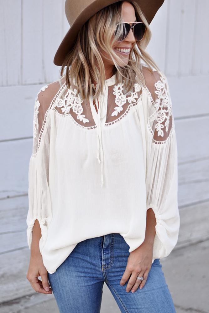 Chic white formal blouse featuring lace details, v-neckline, and long balloon sleeves, perfect for spring and autumn occasions.