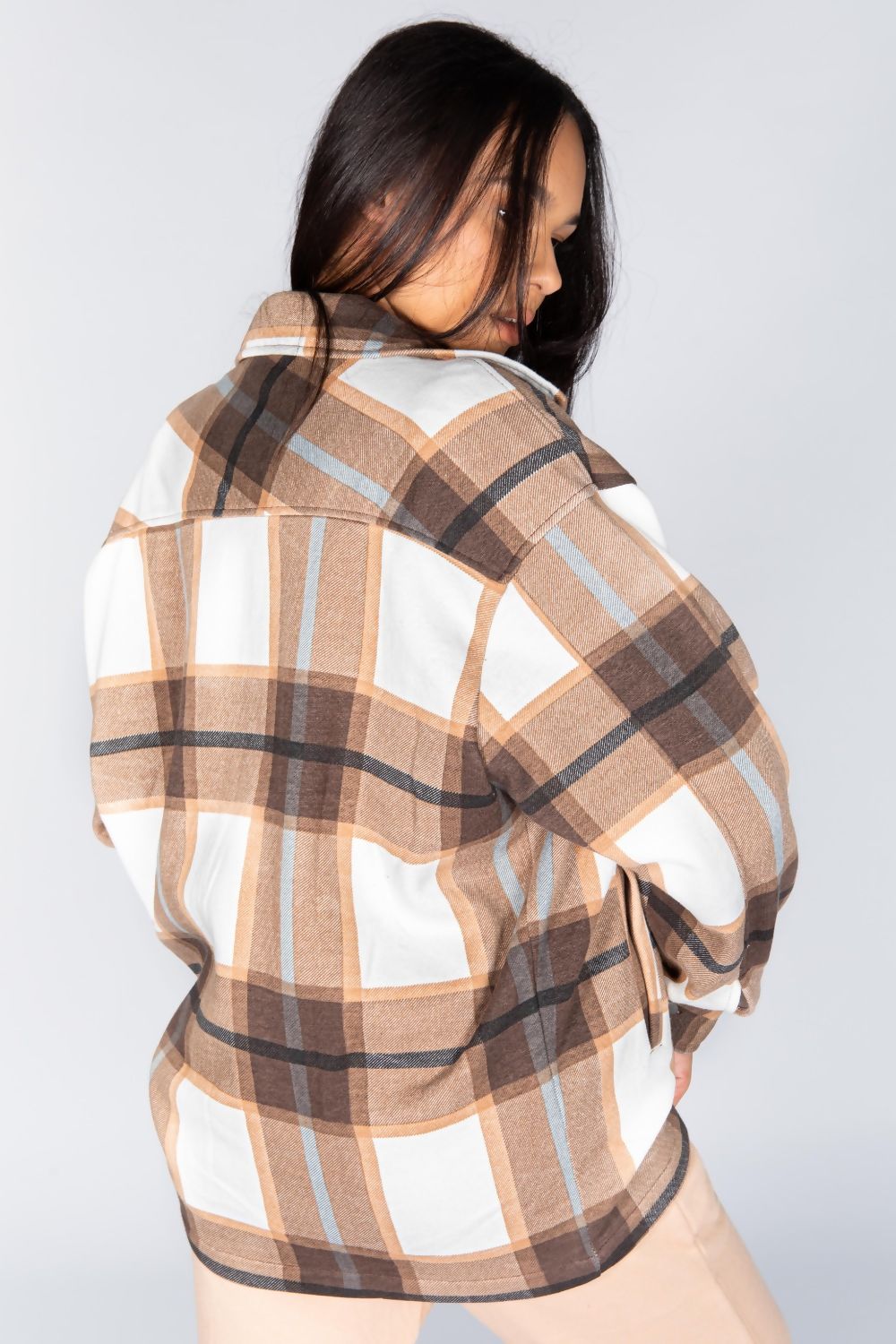 Chocolate Check Shacket for women featuring an oversized fit, button fastening, and two front chest pockets.