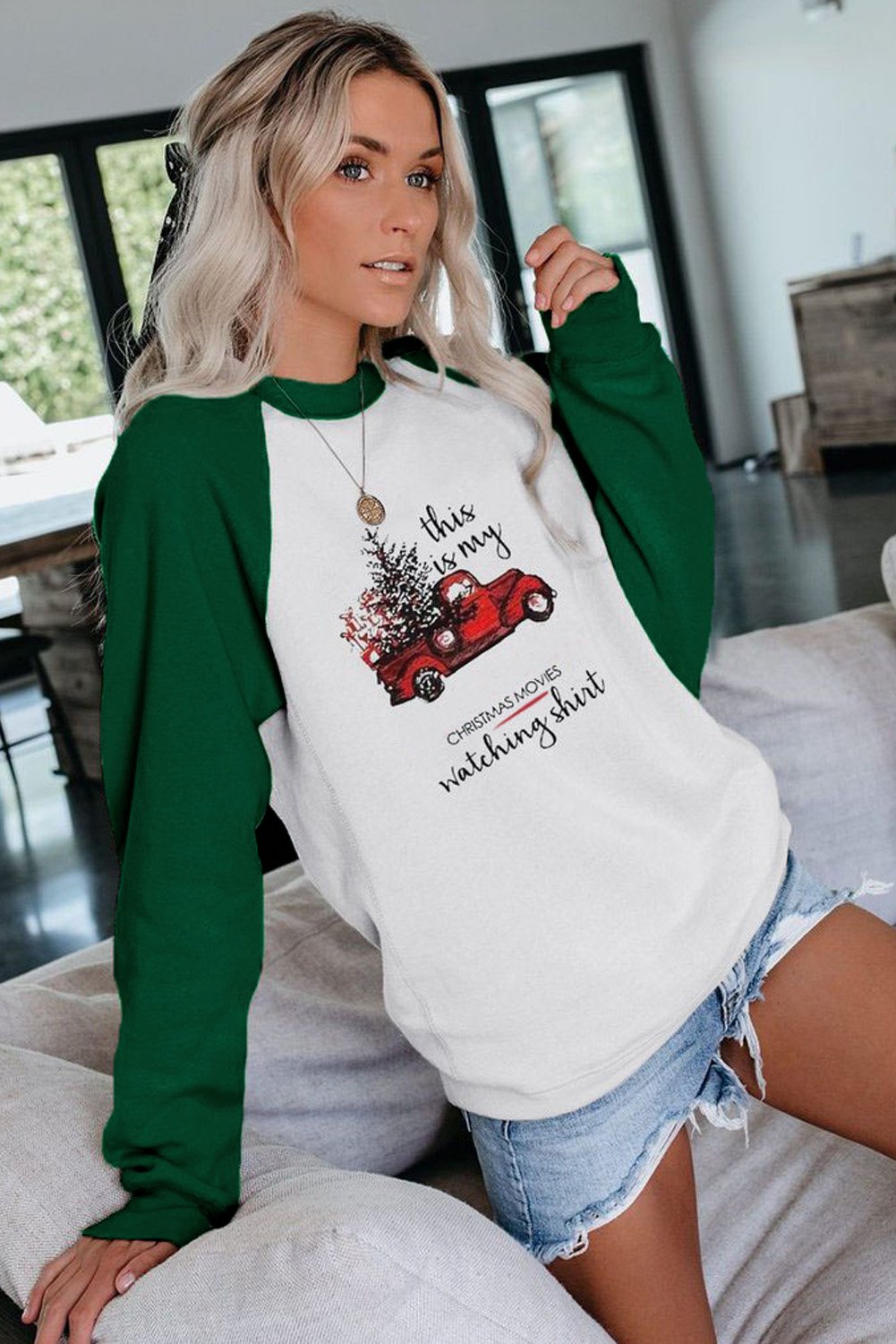 A cozy Christmas Printed Loose Sweatshirt featuring a festive design, pullover style, and raglan sleeves, perfect for holiday celebrations.