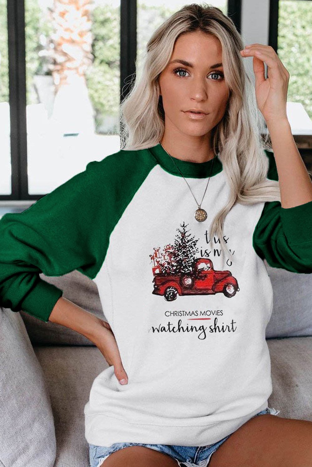 A cozy Christmas Printed Loose Sweatshirt featuring a festive design, pullover style, and raglan sleeves, perfect for holiday celebrations.