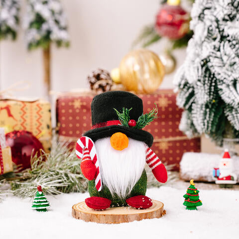 A festive Christmas Short Leg Gnome made of polyester, featuring a whimsical design with a short body and a long hat, perfect for holiday decor.