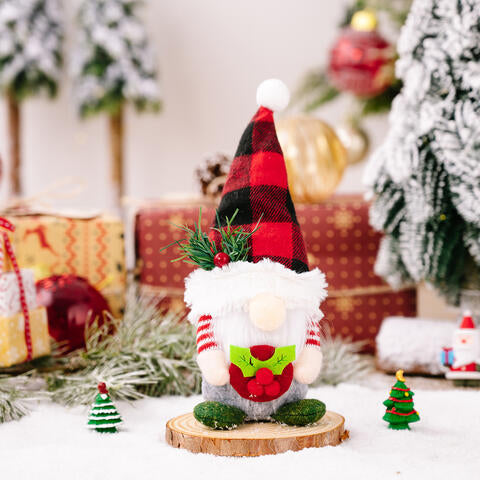 A festive Christmas Short Leg Gnome made of polyester, featuring a whimsical design with a short body and a long hat, perfect for holiday decor.