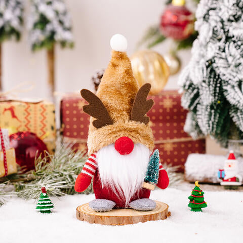 A festive Christmas Short Leg Gnome made of polyester, featuring a whimsical design with a short body and a long hat, perfect for holiday decor.