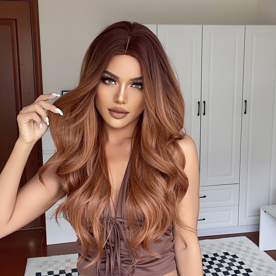 Cinnamon Wig featuring wavy brown synthetic hair with a monofilament cap, ideal for women seeking a stylish and comfortable hair solution.