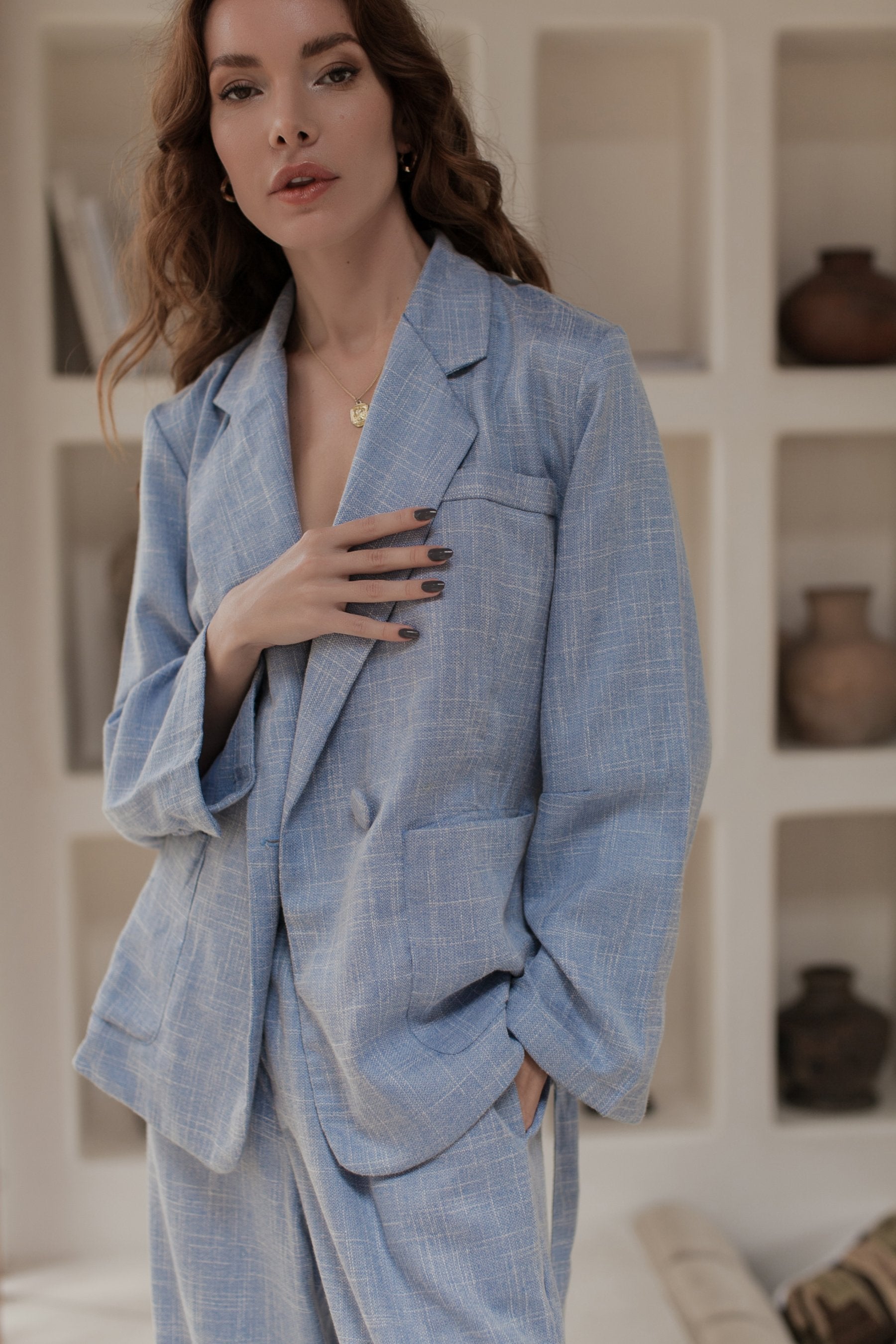 Coco Cotton Belted Blazer in Latte color, featuring structured shoulders and a matching tie belt, styled elegantly.