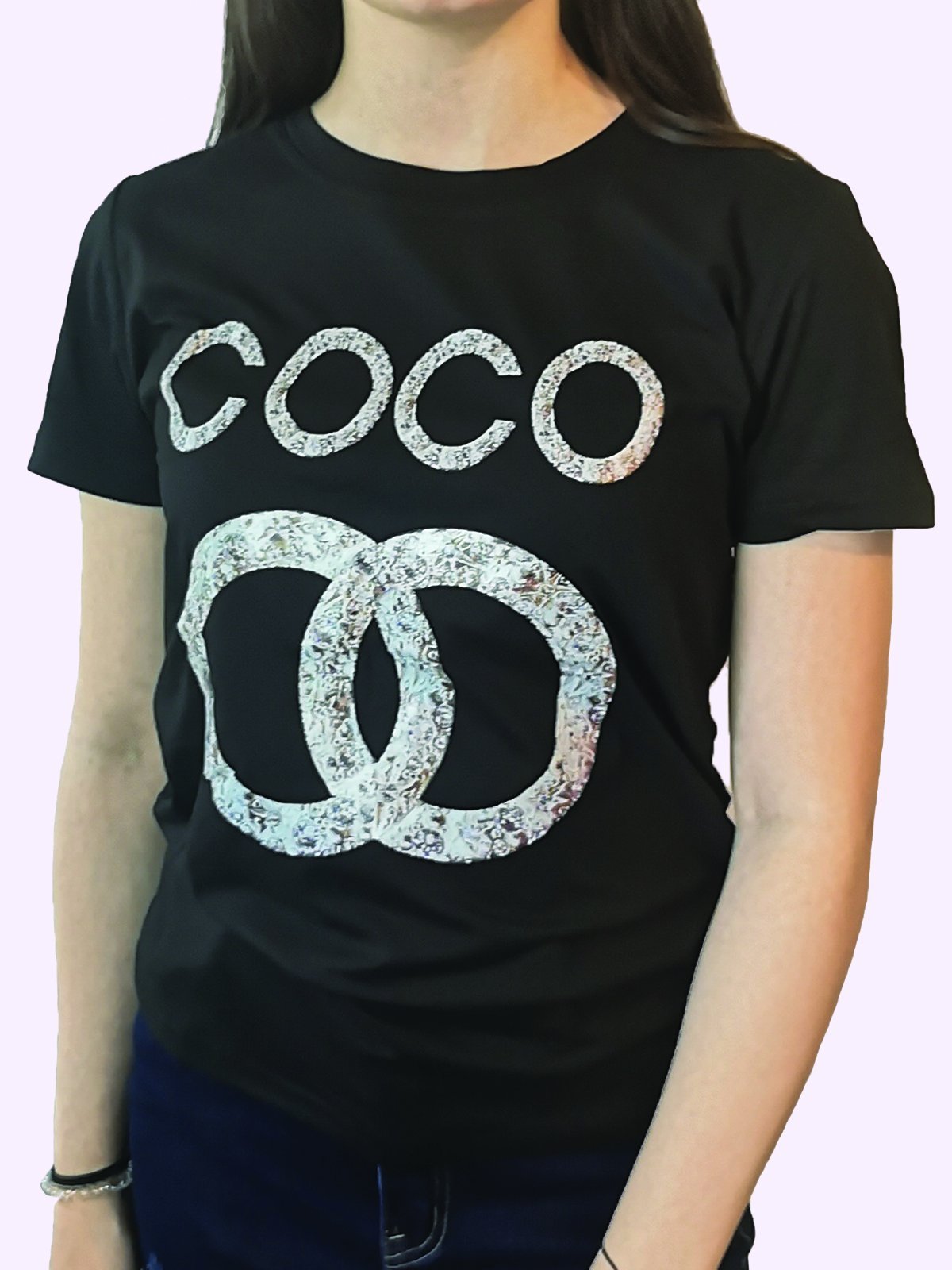 Coco T-shirt Tee/Top in Black, showcasing its stylish design and comfortable fabric.