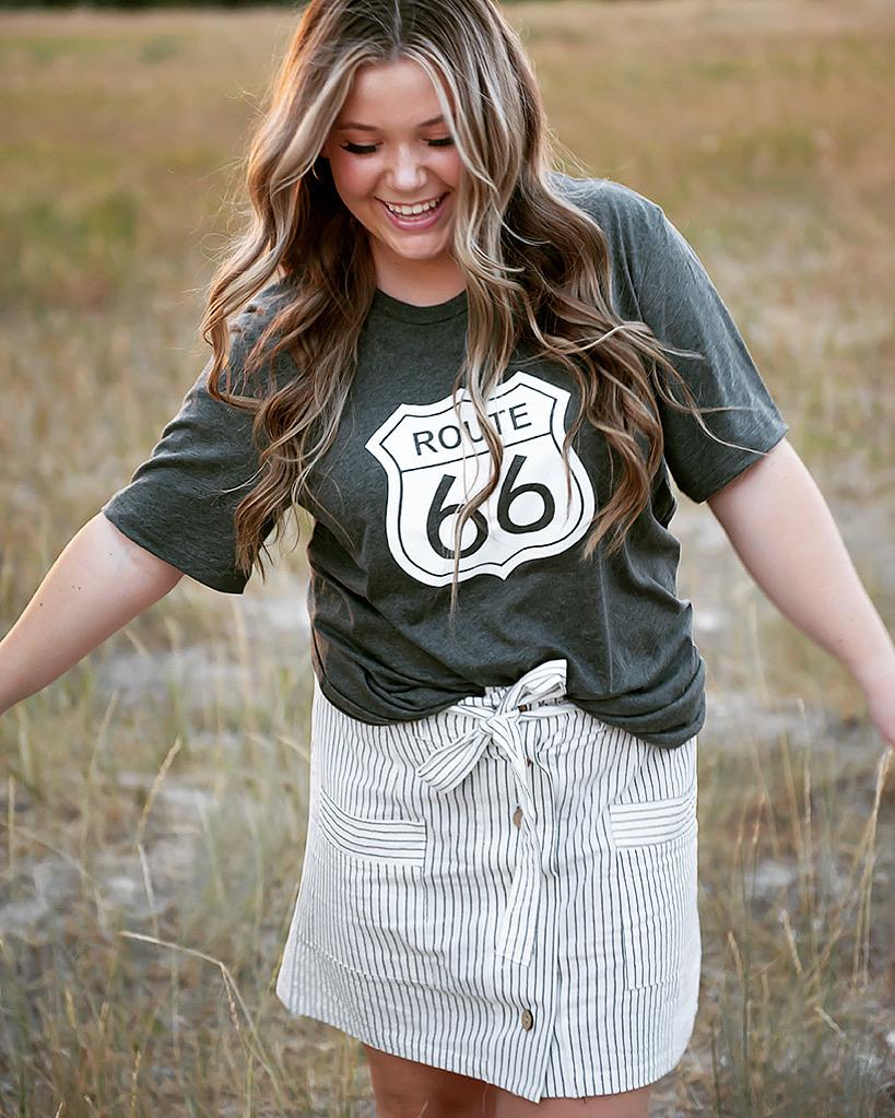 Coconut Button Stripe Woven Skirt in Cream with charcoal stripes and matching belt, featuring functional accent pockets.