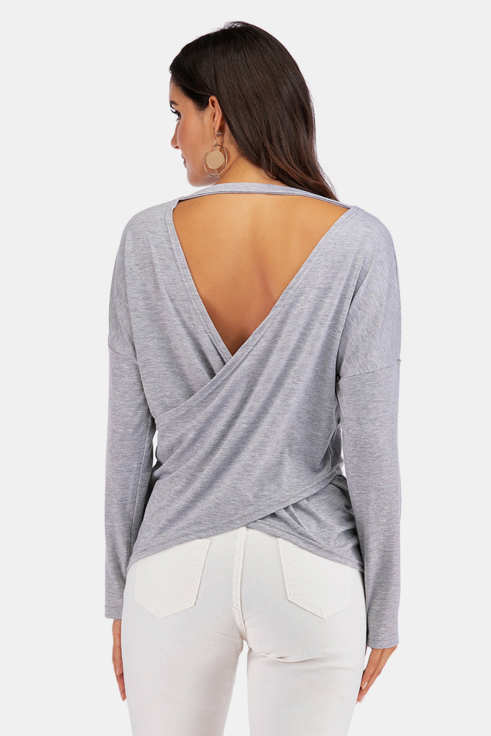 Cold-Shoulder Asymmetrical Neck Sweatshirt featuring crisscross open back and long sleeves in a studio setting.