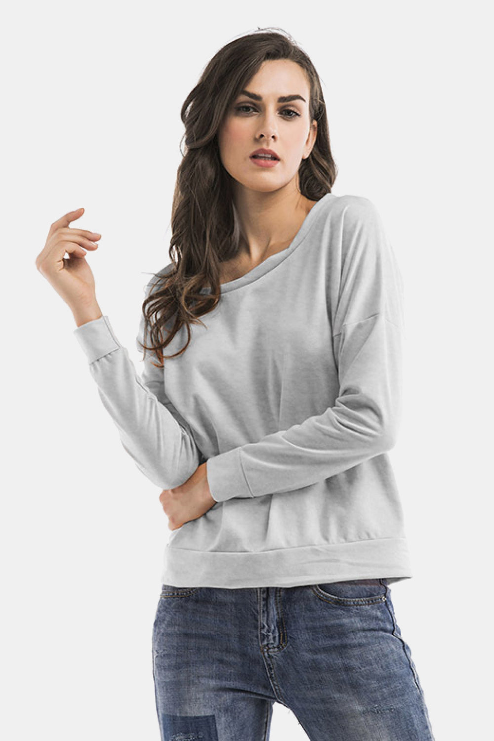 Cold-Shoulder Asymmetrical Neck Sweatshirt featuring crisscross open back and long sleeves in a studio setting.