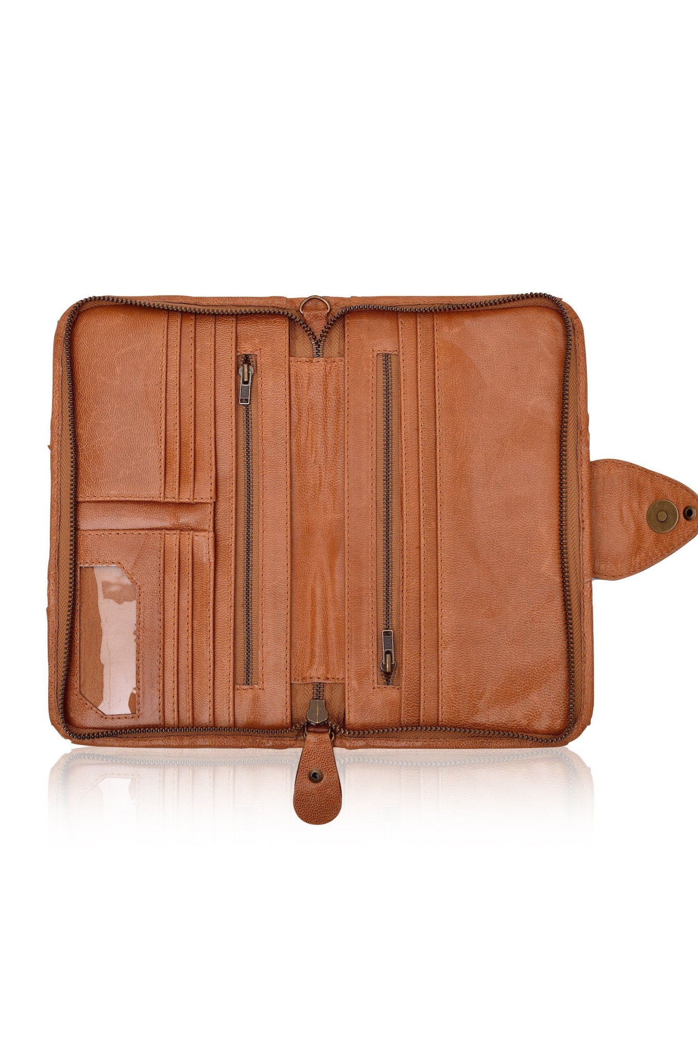 Colibri Leather Crossbody Clutch featuring intricate cut-out work and leather stitching, available in various colors.