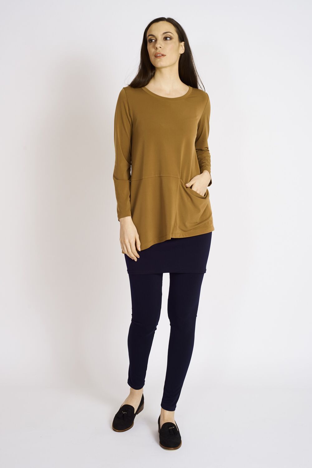 Collins Pocket Tunic in various colors, showcasing its stylish design and functional pockets.