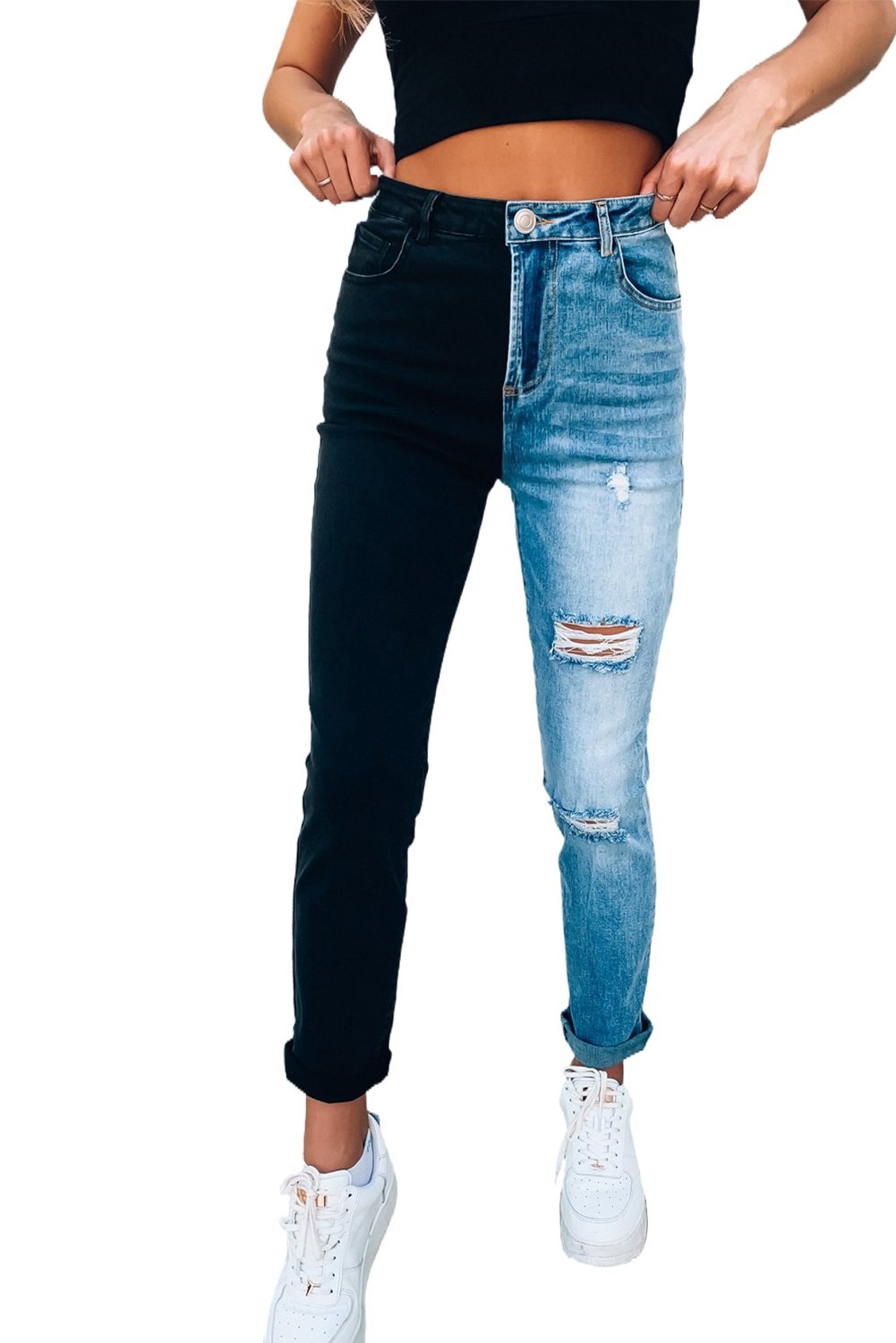 A pair of stylish Color Block Distressed Skinny Jeans featuring contrasting colors and distressed details, perfect for modern ladies.