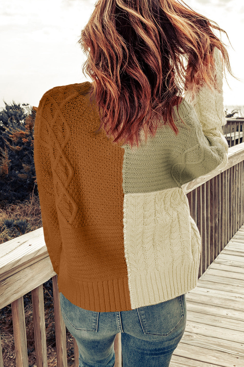 Color Block Mixed Knit Sweater displayed in a flat lay outdoors, showcasing its chic design and vibrant colors.