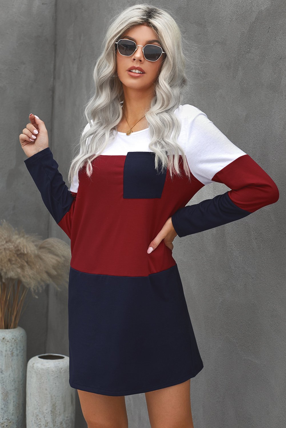 Color Block Pocket Mini Dress featuring a vibrant triple-color design, long sleeves, and practical pockets, perfect for stylish outings.