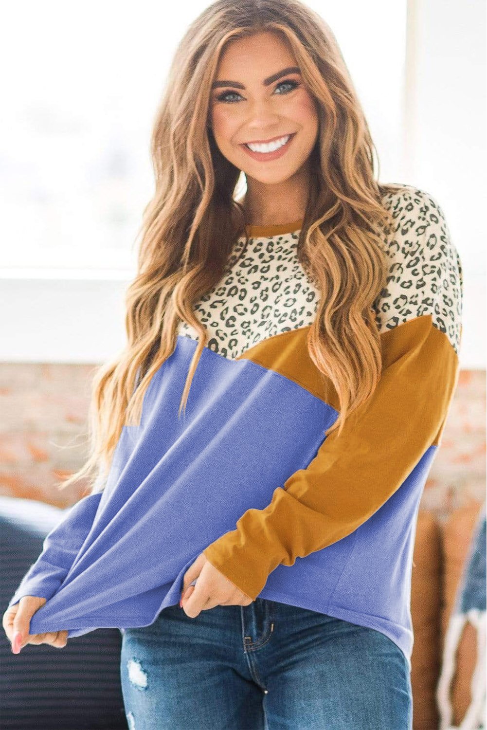 Color Block Splicing Long Sleeve Top featuring vibrant leopard print and contrasting colors, perfect for casual wear.