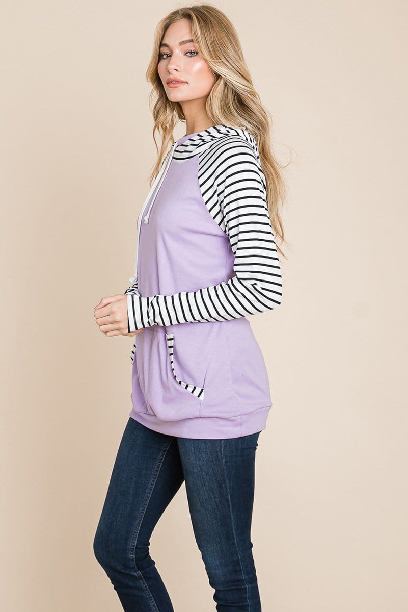 A stylish Color Block Striped Double Hoodie Sweatshirt featuring black and white stripes with a solid top, showcasing front pockets and raglan sleeves.