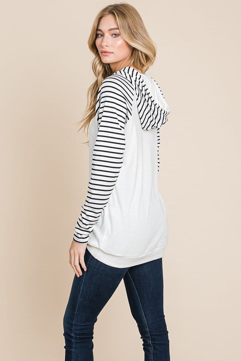 A stylish Color Block Striped Double Hoodie Sweatshirt featuring black and white stripes with a solid top, showcasing front pockets and raglan sleeves.