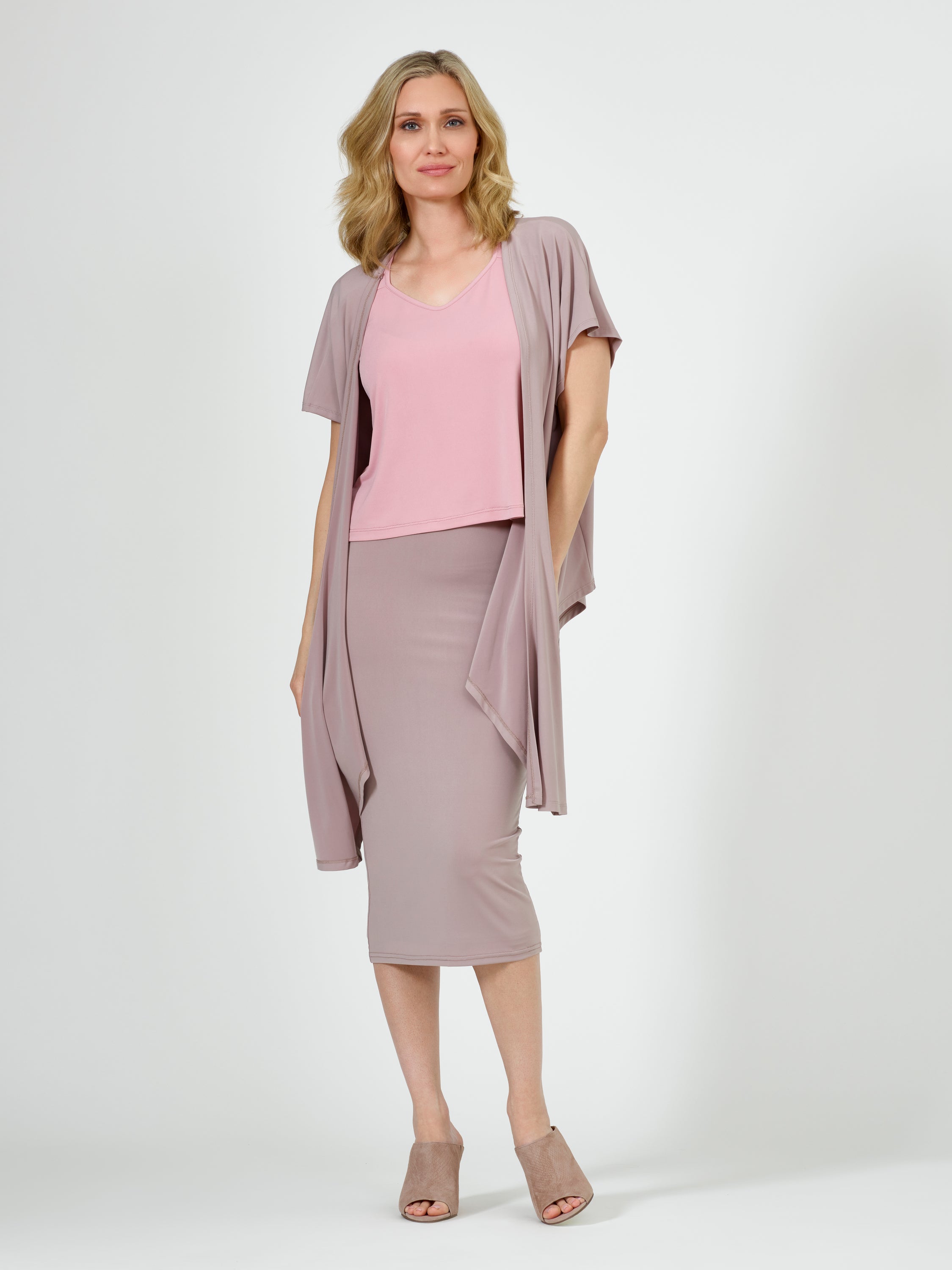 A stylish Column Skirt featuring a double-lined design, elastic waist, and versatile fabric, perfect for any season.