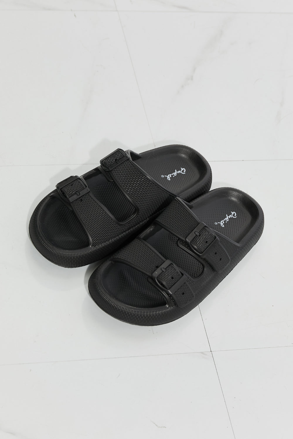 Comfy Casual Rubber Slide Sandal in Black featuring adjustable straps and a trendy platform design, perfect for summer wear.