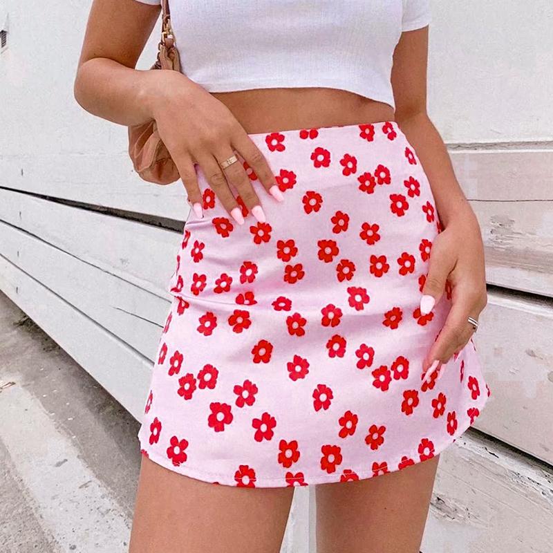 Conmoto beach high waist floral women short skirt in pink, featuring a vibrant floral pattern and A-line silhouette, perfect for summer outings.