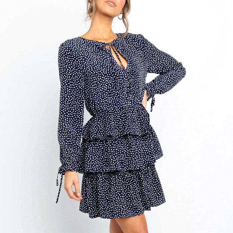 Conmoto Elegant Women Long Sleeve Dot Short Dress featuring ruffles, flare sleeves, and a playful dot pattern, perfect for autumn wear.