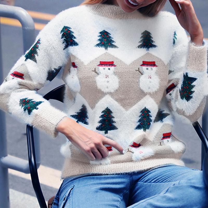 A stylish women's winter sweater featuring a cute snowman design, made from soft mink cashmere with full-length sleeves and an O-neck collar.