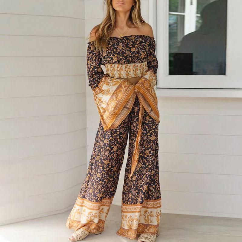 Conmoto long sleeve bohemian jumpsuit set for women featuring a wide leg design in a stylish print pattern, perfect for autumn wear.