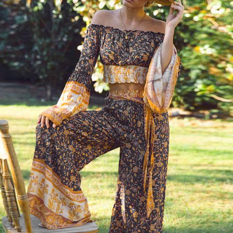 Conmoto long sleeve bohemian jumpsuit set for women featuring a wide leg design in a stylish print pattern, perfect for autumn wear.