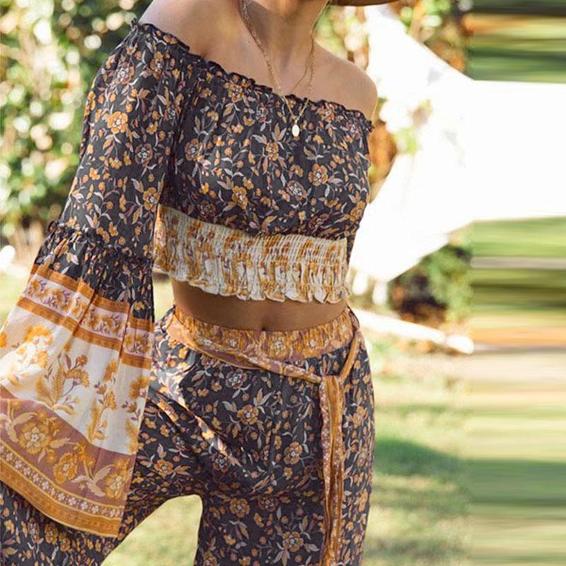 Conmoto long sleeve bohemian jumpsuit set for women featuring a wide leg design in a stylish print pattern, perfect for autumn wear.