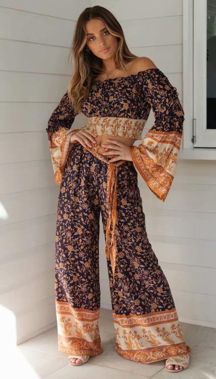 Conmoto long sleeve bohemian jumpsuit set for women featuring a wide leg design in a stylish print pattern, perfect for autumn wear.