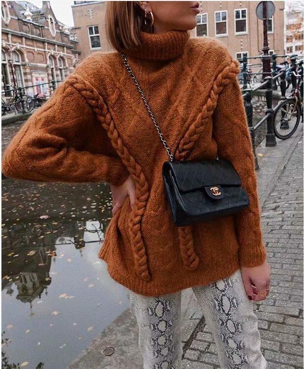 Conmoto Solid Knitted Winter Women Sweater in a cozy oversized fit, made from soft mohair with a vintage turtleneck design.