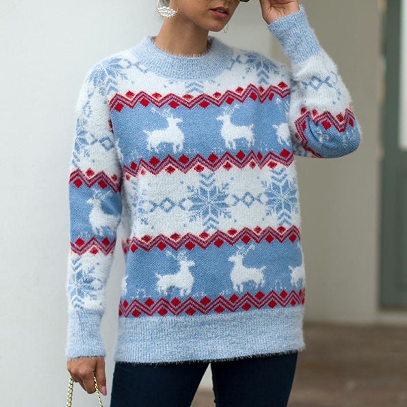 Conmoto Women Winter Christmas Deer Jumper featuring a cartoon deer pattern, made from soft mink cashmere, ideal for winter wear.