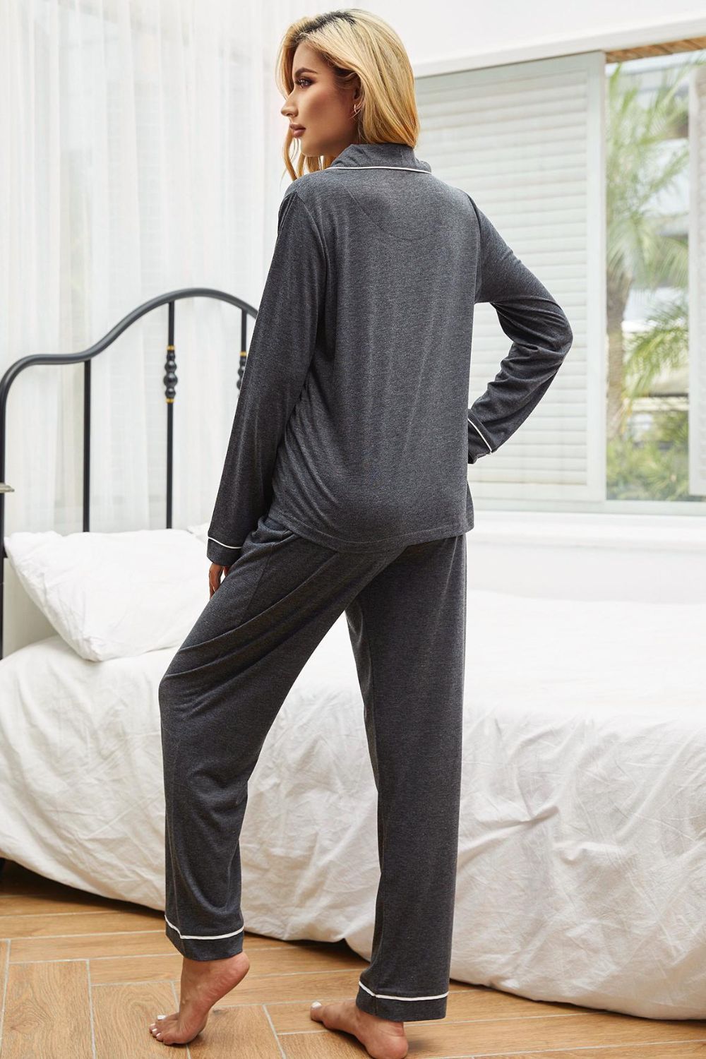 Contrast piping button down top and pants loungewear set displayed in a studio setting, showcasing its minimalist design and elegant features.