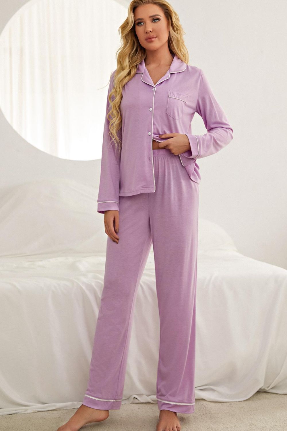 Contrast piping button down top and pants loungewear set displayed in a studio setting, showcasing its minimalist design and elegant features.