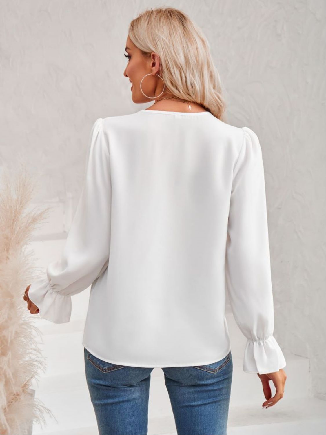 A stylish Contrast Trim Flounce Sleeve V-Neck Blouse featuring elegant flounce sleeves and a chic contrast pattern, perfect for casual and romantic occasions.