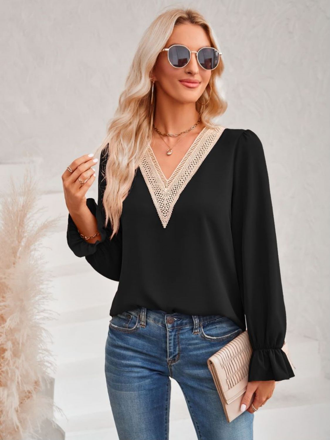 A stylish Contrast Trim Flounce Sleeve V-Neck Blouse featuring elegant flounce sleeves and a chic contrast pattern, perfect for casual and romantic occasions.