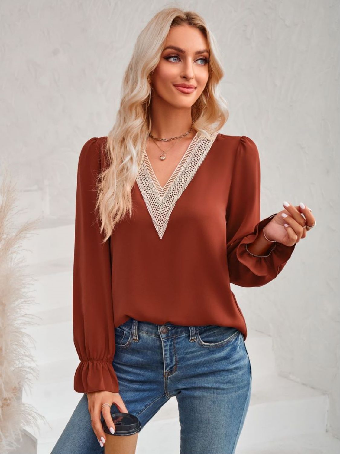 A stylish Contrast Trim Flounce Sleeve V-Neck Blouse featuring elegant flounce sleeves and a chic contrast pattern, perfect for casual and romantic occasions.