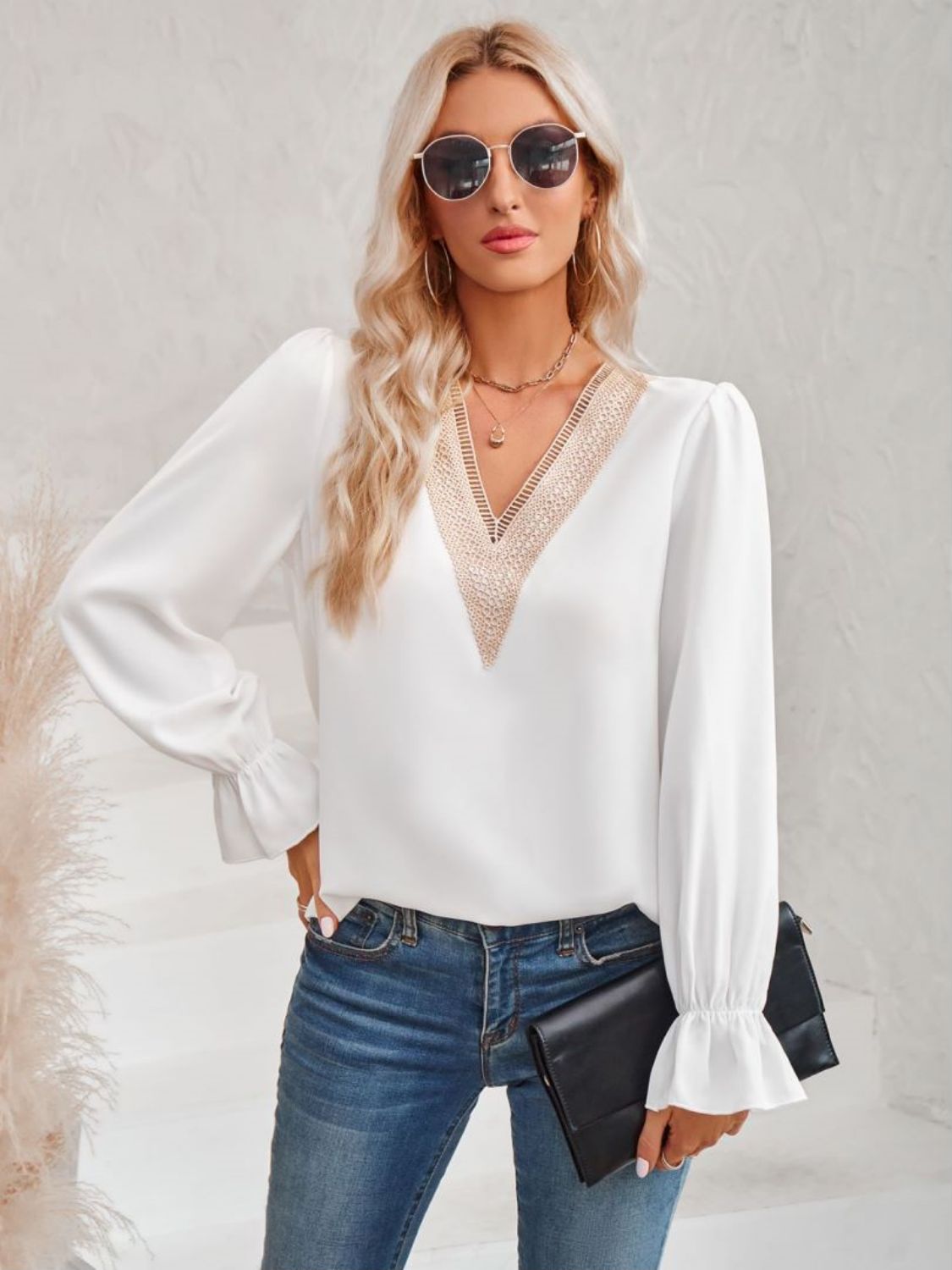 A stylish Contrast Trim Flounce Sleeve V-Neck Blouse featuring elegant flounce sleeves and a chic contrast pattern, perfect for casual and romantic occasions.