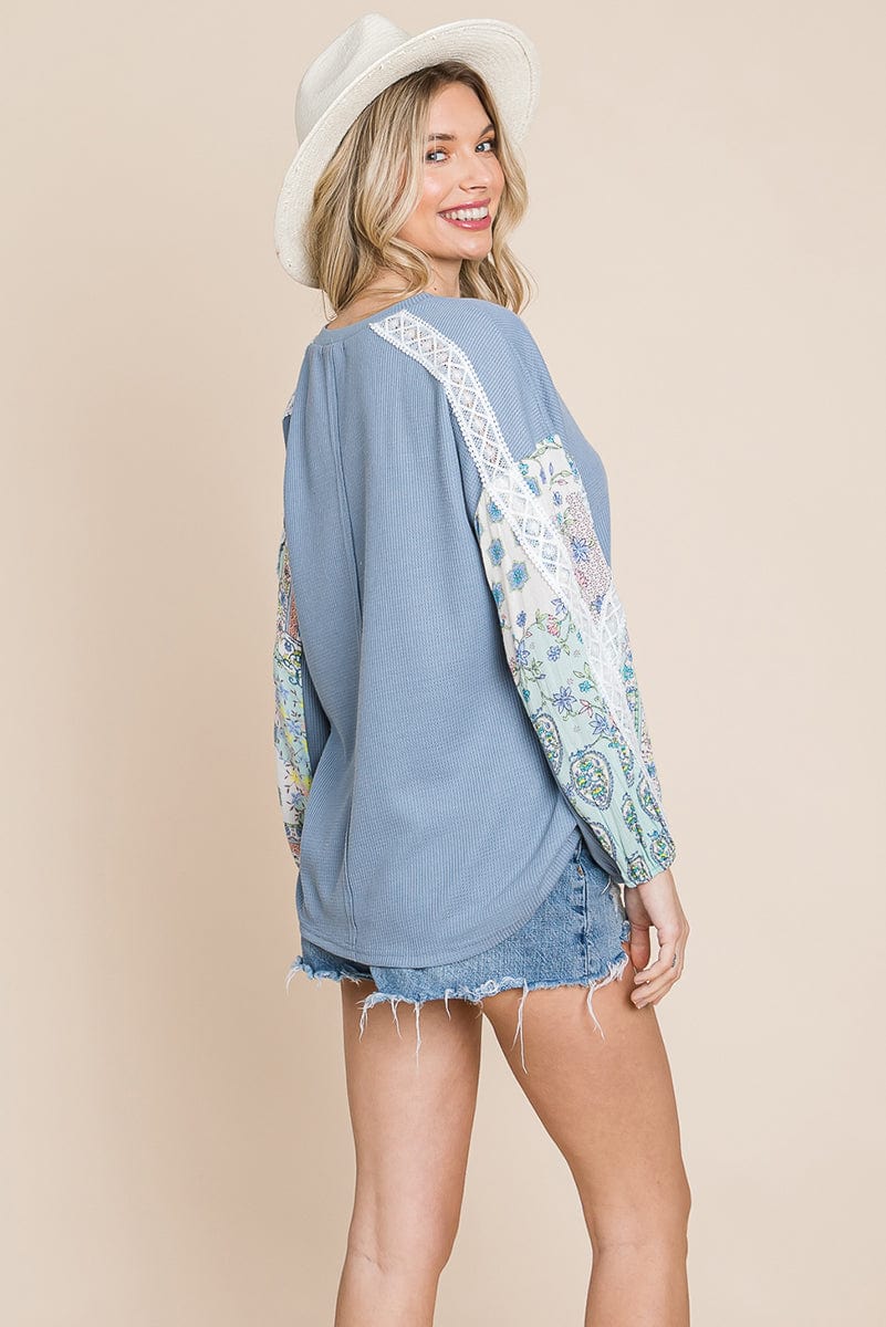 Contrasting Blossom Sleeve Waffle Knit Top featuring floral patchwork sleeves and a boat neck design, perfect for casual wear.