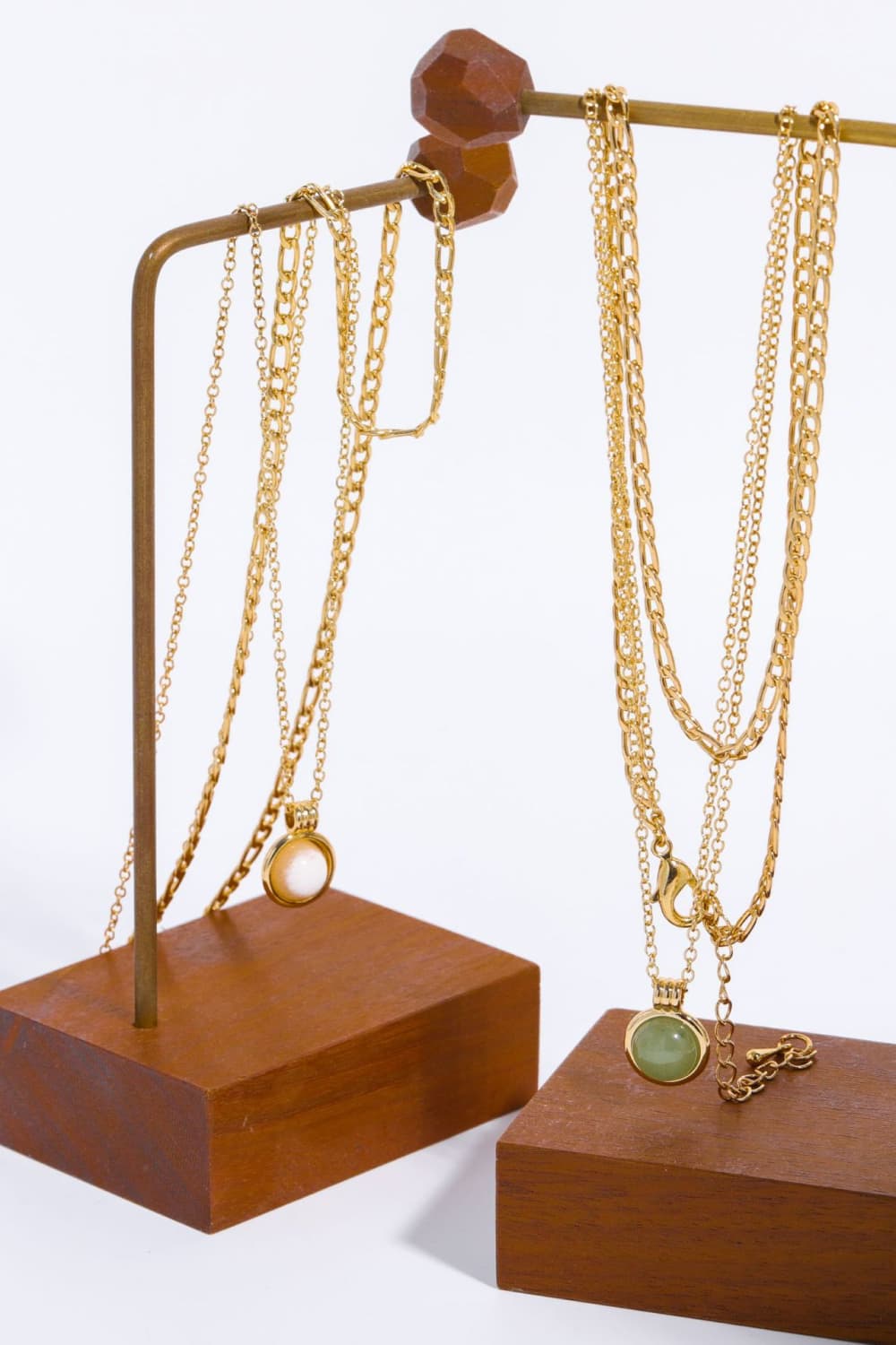 Copper 14K gold pleated round shape aventurine pendant necklace with adjustable chain and elegant design.