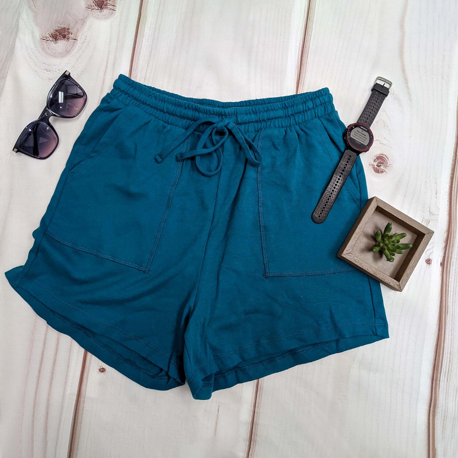 Cotton Drawstring Waist Shorts in various colors, featuring a high-rise elasticated waist and functional front patch pockets.