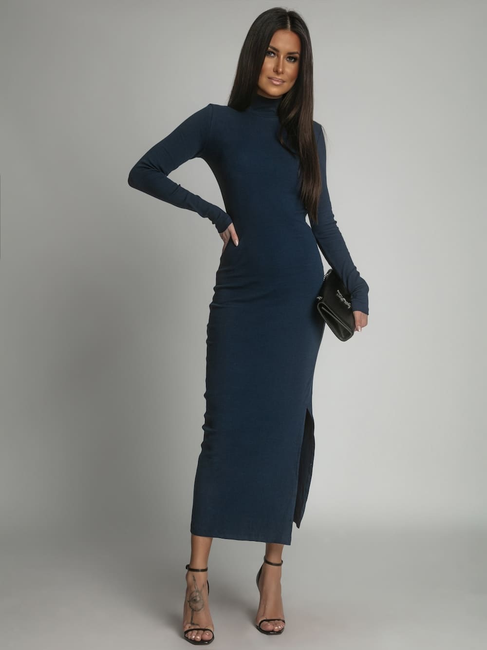 Navy blue cotton fitted maxi dress with turtleneck, showcasing its soft fabric and elegant design.