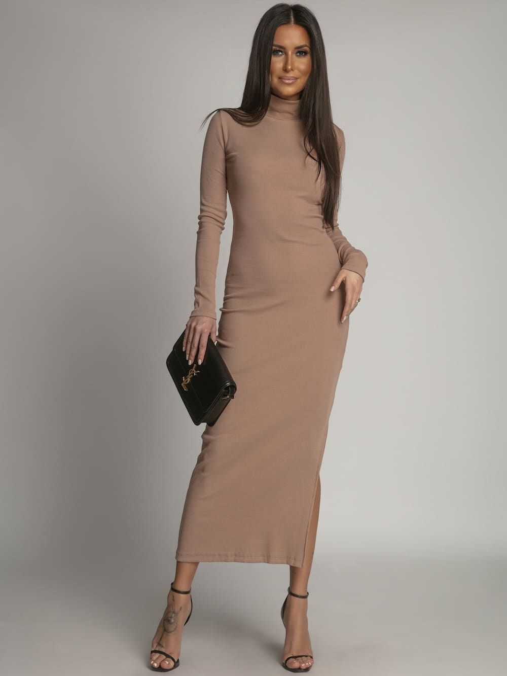 Cotton fitted maxi dress in cappuccino color with a stylish turtleneck, showcasing its soft fabric and elegant design.